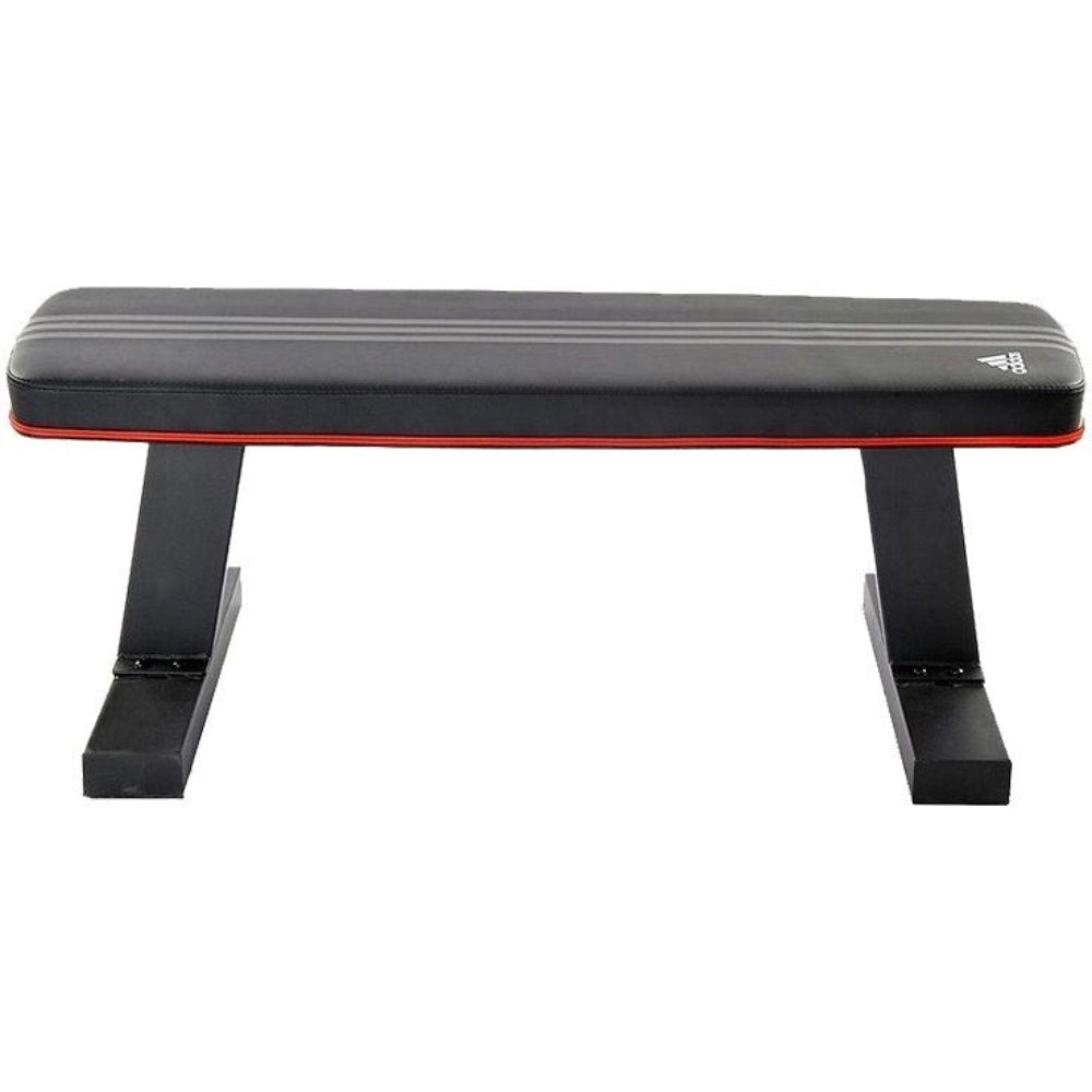 Black and red weight bench with Adidas logo on a white background