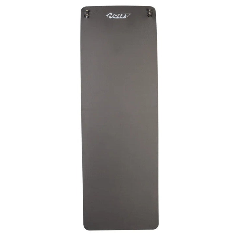 A dark gray rectangular yoga mat with rounded corners and a small white logo near the top, shown against a plain white background.