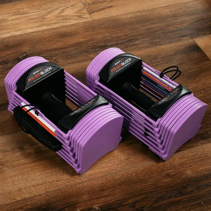 Pair of purple arm exercisers on a wooden floor