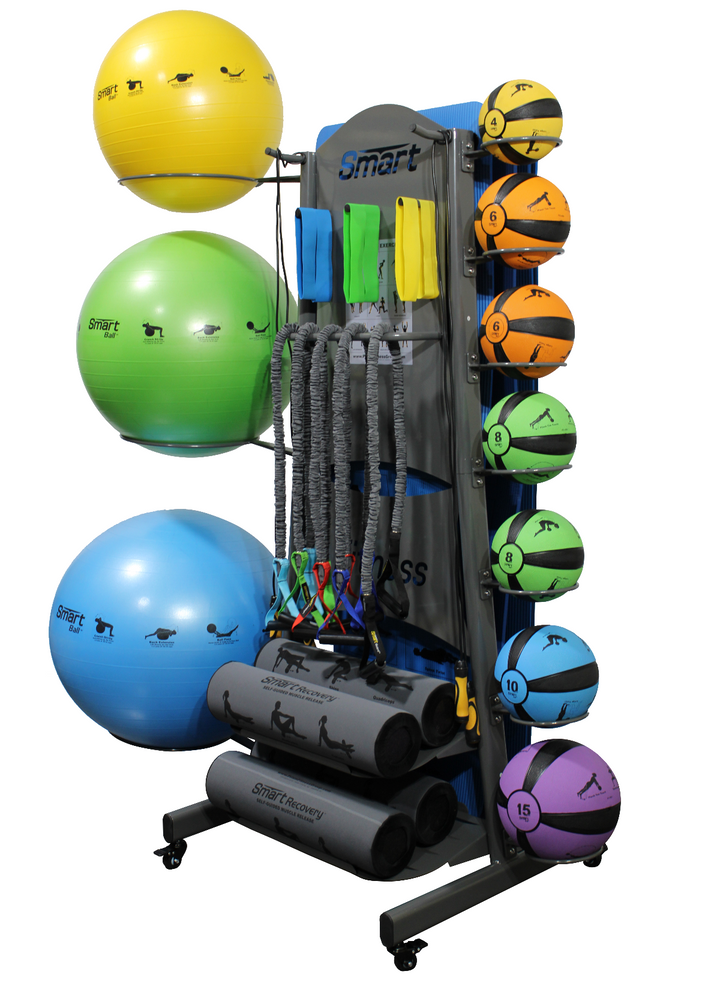 Colorful exercise balls and training equipment on a white background