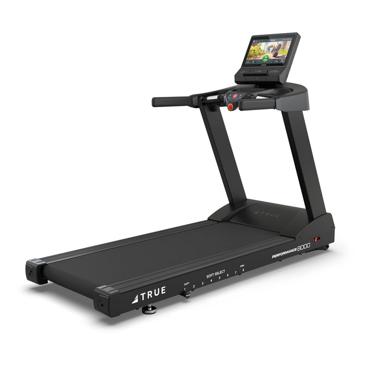 Black treadmill with a digital display on a white background