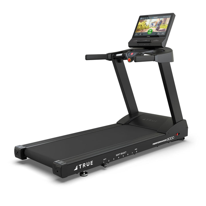 Black treadmill with a digital display on a white background