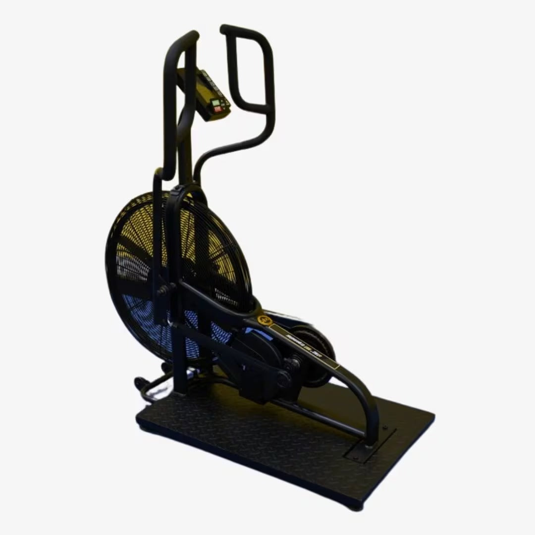 Black exercise bike with handles on a white background