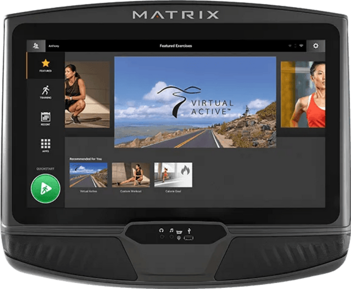 A black Matrix treadmill with a large touchscreen display showing the Virtual Active fitness interface, photographed against a clean white background.