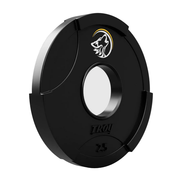 Black circular object with a logo on a light gray background