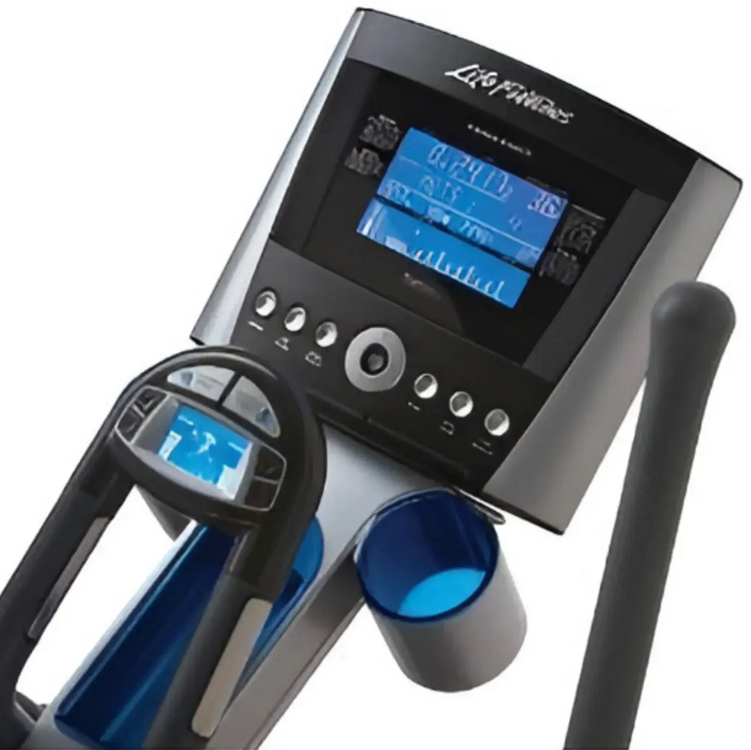 Life Fitness elliptical exercise machine close-up showing the console with a blue display screen, handgrip controls, and a cup holder on a white background.