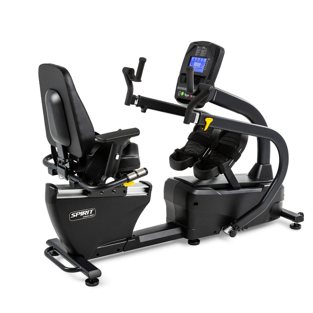 Black exercise bike with digital display on a white background
