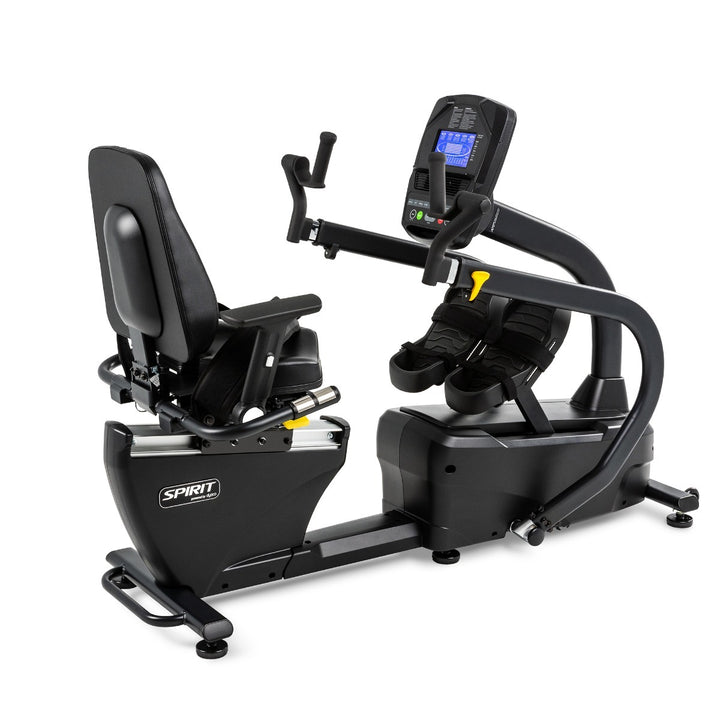 Black exercise bike with digital display on a white background