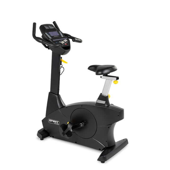 Black exercise bike with digital display on a white background