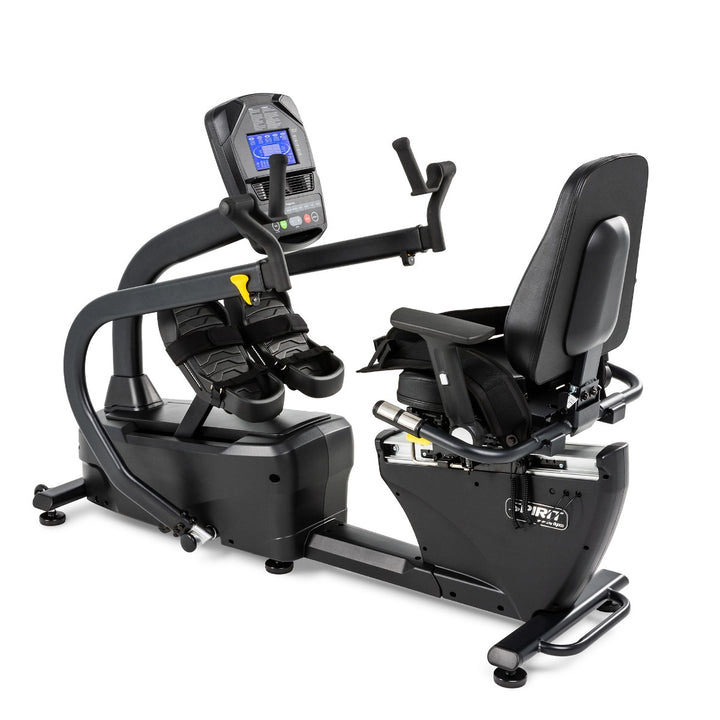 Black exercise bike with digital display on a white background