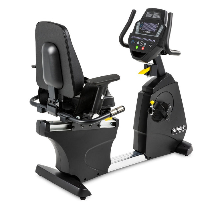 Recumbent exercise bike with digital display on a white background