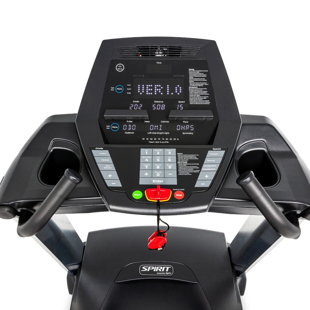 Close-up of a treadmill's control panel with digital display and brand logo.