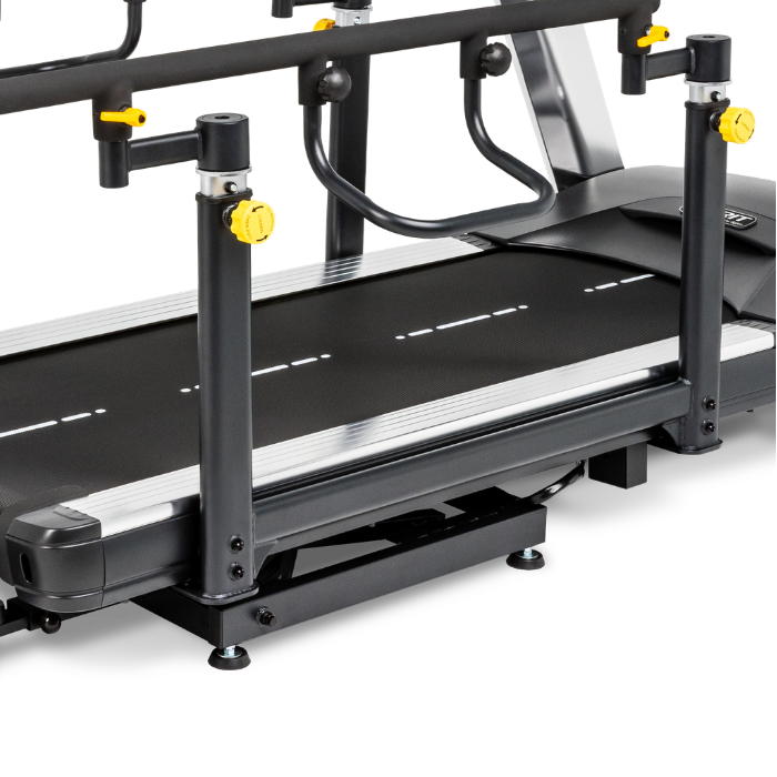 A black and silver treadmill with an attached step platform and yellow adjustment knobs, shown on a clean white background.