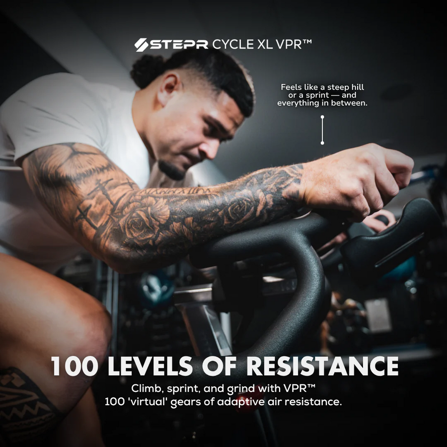 Person using a Stepr Cycle XL VPR exercise bike with text highlighting features.