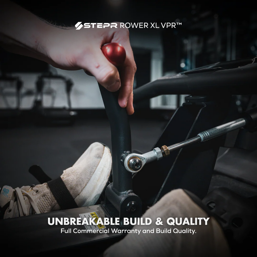 Person adjusting a vehicle component with a focus on quality and durability, featuring the Stepr Rower XL VPR brand.
