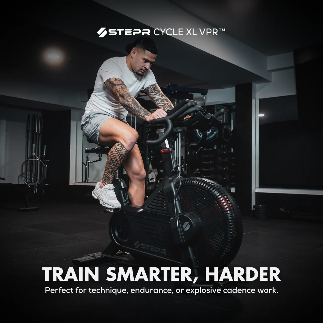 Person using a stationary bike with 'Stepr Cycle XL VPR' branding and text 'Train Smarter, Harder'.