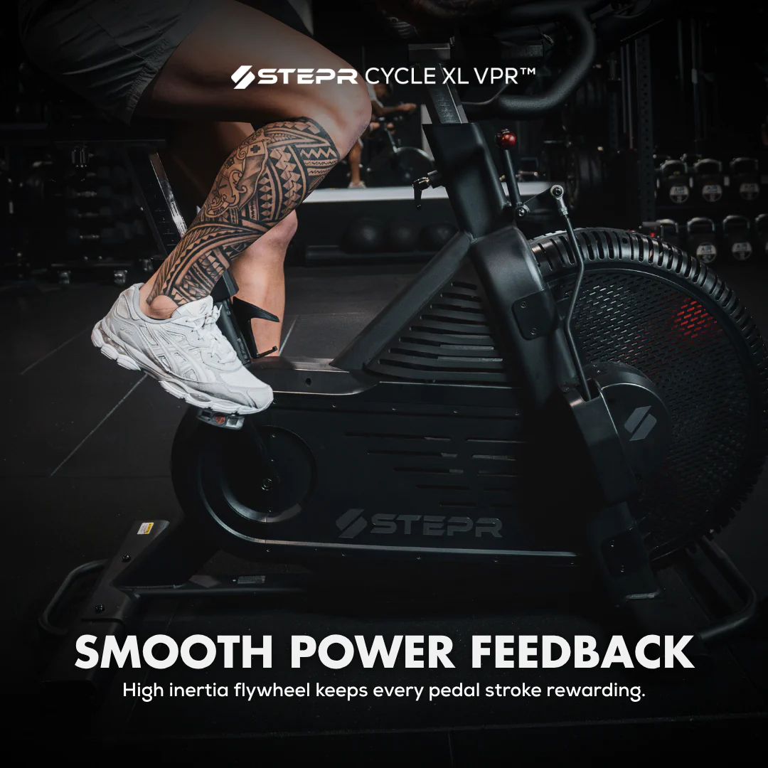 Person using a Stepr Cycle XL VPR exercise bike with text about smooth power feedback.