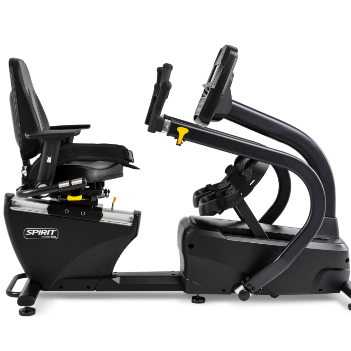 A black and gray recumbent exercise bike with a digital display screen, shown from a side profile on a solid white background.