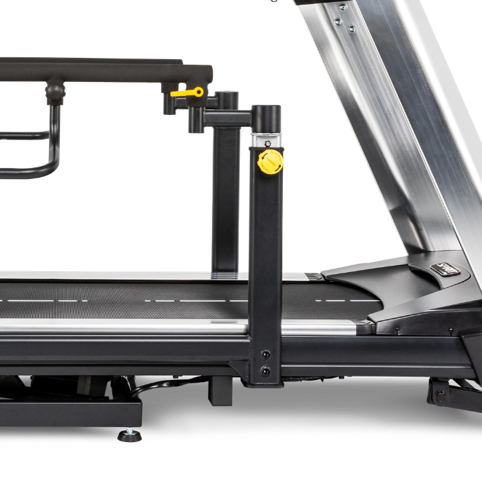 Side view of a treadmill with a black frame, silver handrails, and small yellow adjustment knobs, photographed on a white background.