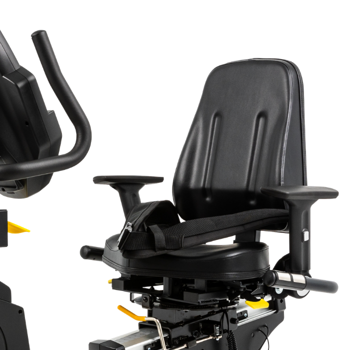 Black motorized wheelchair or mobility chair with a padded seat, armrests, and a mounted exercise handlebar, shown on a white background.