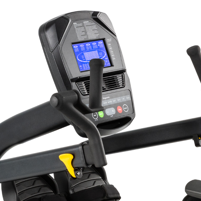 Close-up of a black cardio treadmill console and handlebar assembly with a blue display screen, shown against a plain white background.