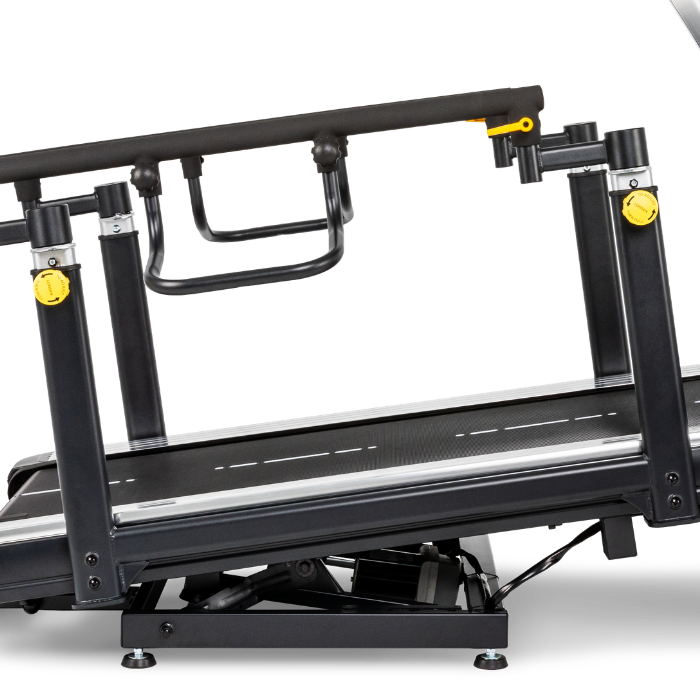 Close-up of a black treadmill with an attached step platform and handrails, shown on a clean white background.