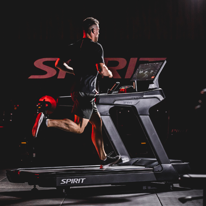 Person running on a treadmill with &