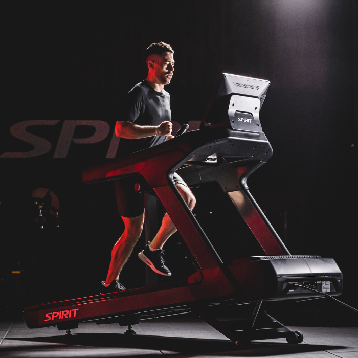 Person using a treadmill with &
