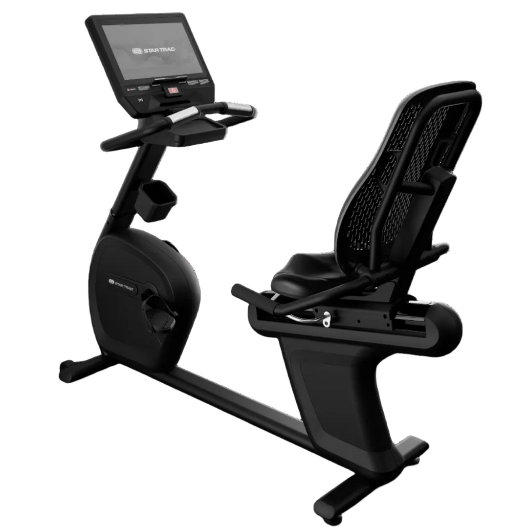 Black exercise bike with digital display on a white background
