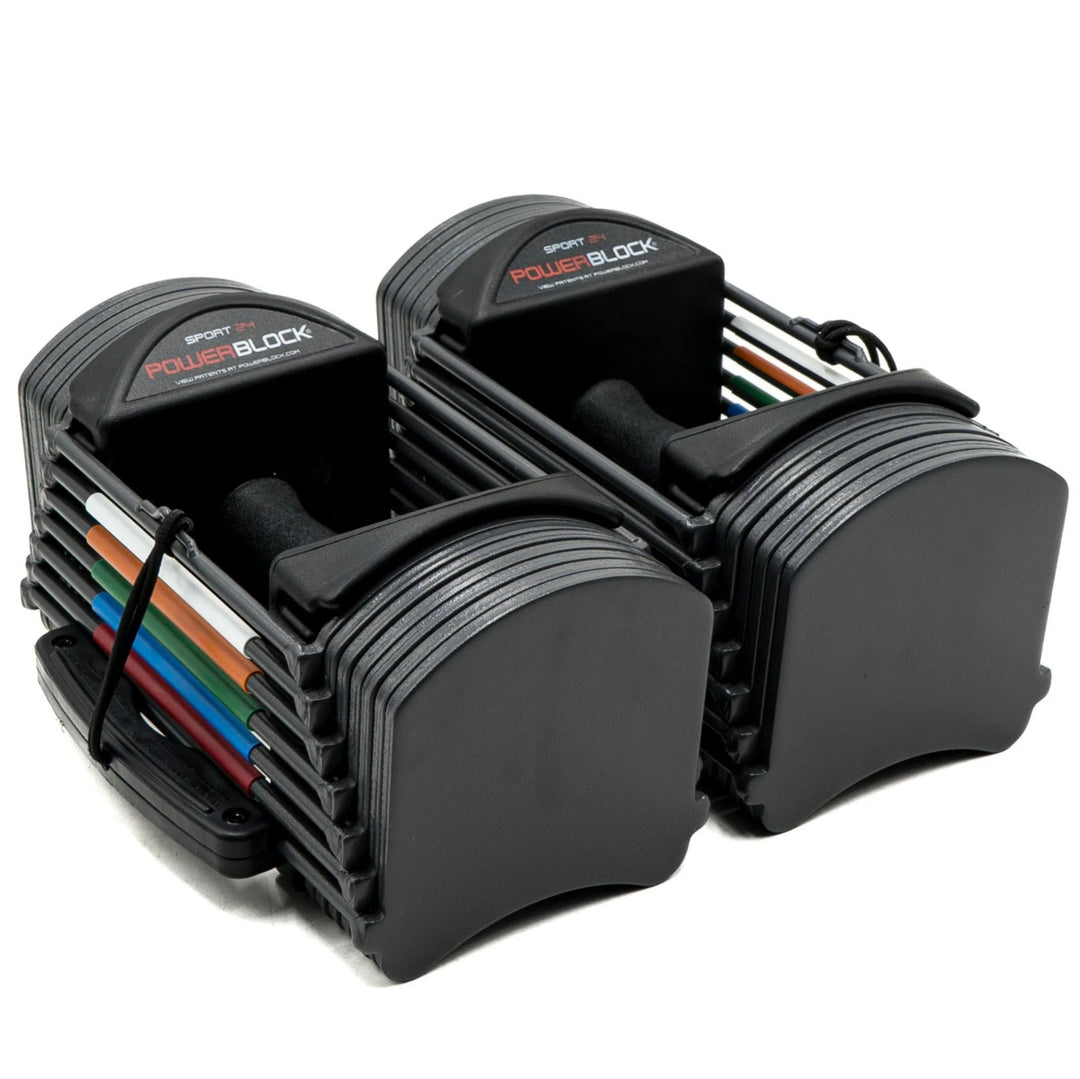 Pair of adjustable dumbbells on a white background