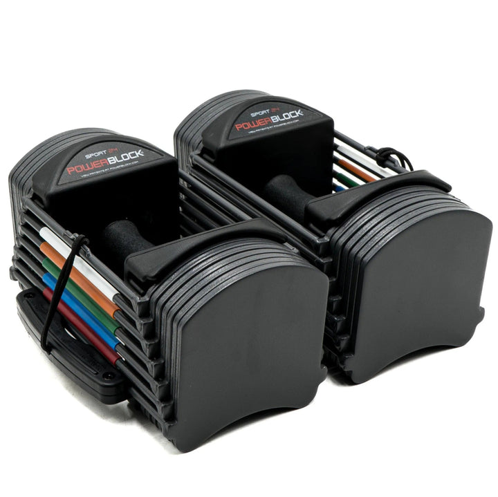 Pair of adjustable dumbbells on a white background